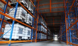 IBC Liquid Containers stacked in Warehouse